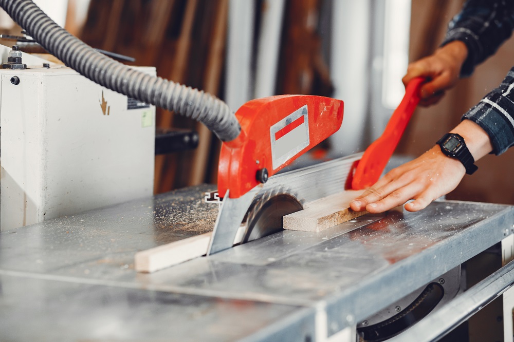 Carpenter Works With Tree